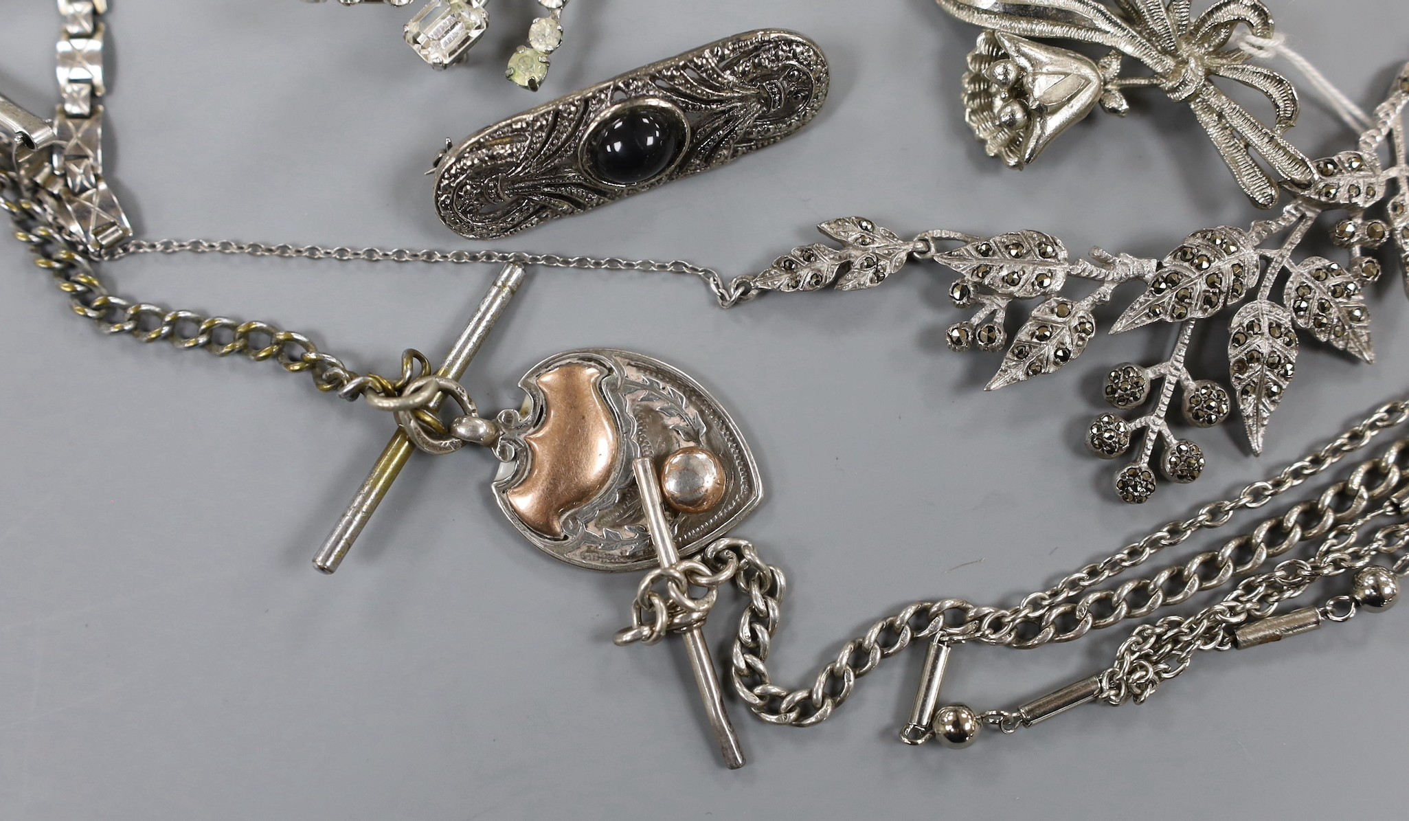 A mixed group of assorted silver and costume jewellery including a silver albert, Scottish hardstone brooch and two silver medallions, a silver fob watch, a white metal open faced pocket watch and a lady's steel Talis wr